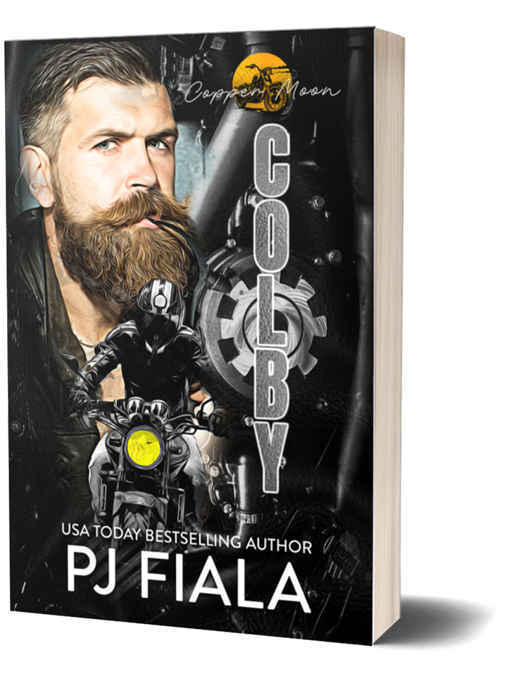 3D paperback of “Colby” by PJ Fiala. The cover shows a tough, bearded hero alongside a motorcycle rider with a bright yellow headlight. Metallic gears and the Copper Moon logo sit behind him, creating a gritty, mechanical aesthetic.