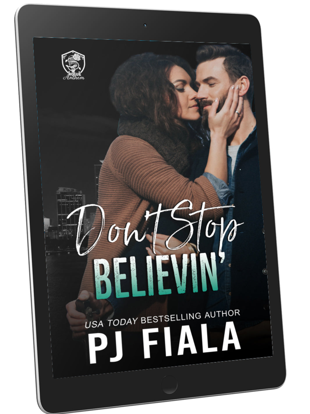 eBook cover of Don't Stop Believin' by PJ Fiala displayed on a black tablet. The cover features a couple sharing an intimate moment against a nighttime city skyline, introducing the first book in the Blossom Springs: Rogue Anthem romantic suspense series.