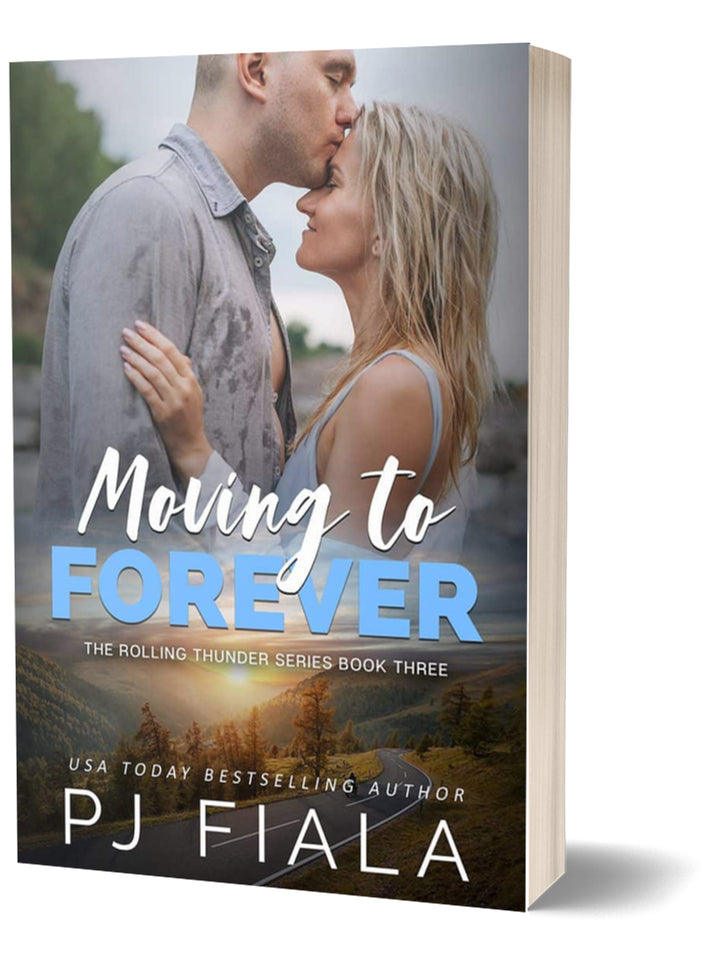 3D paperback edition of Moving to Forever by USA Today bestselling author PJ Fiala. The cover features a couple sharing a tender embrace while the hero kisses the heroine's forehead, with mountains and open countryside below.